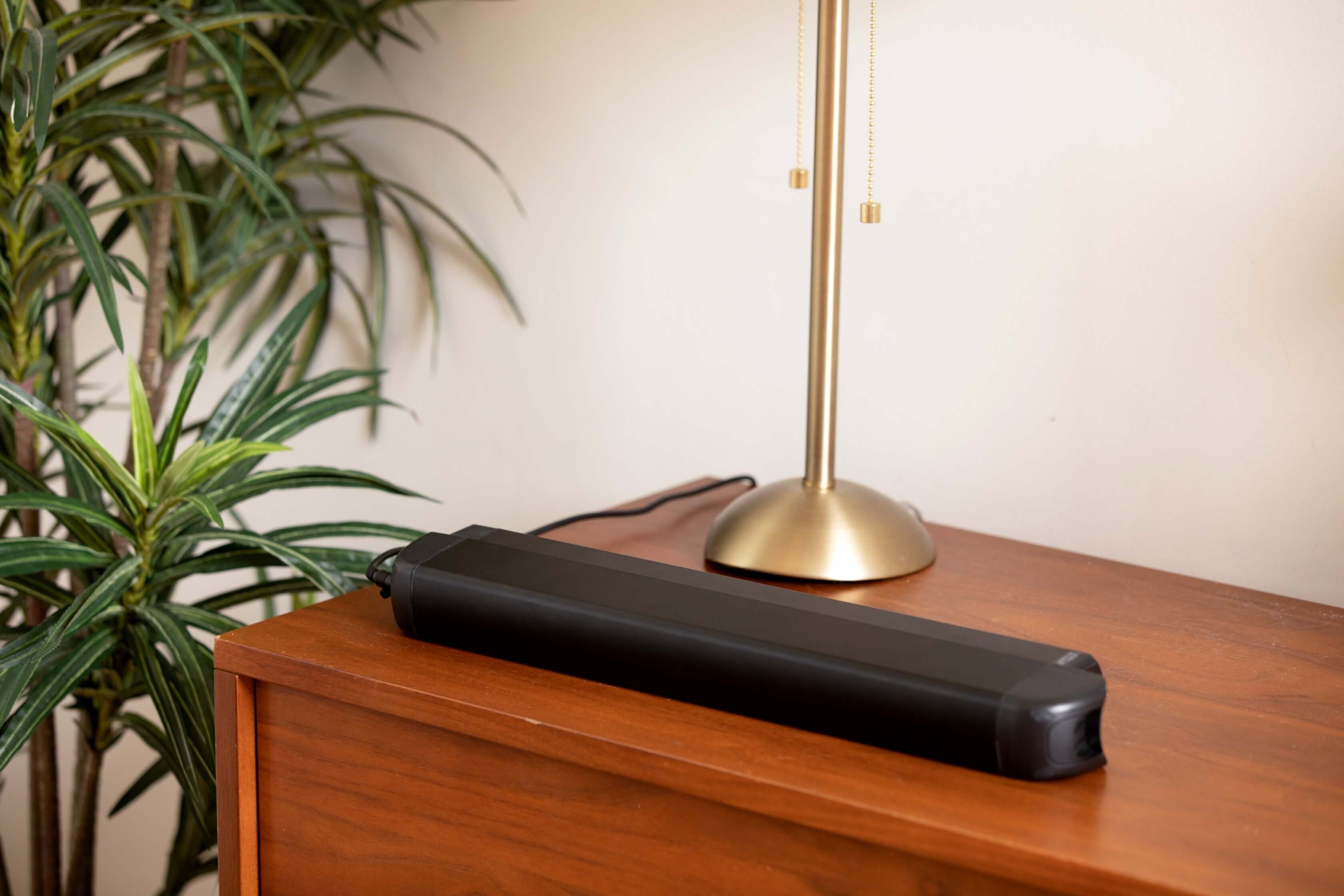 Charging Battery on Mid-Century Sideboard