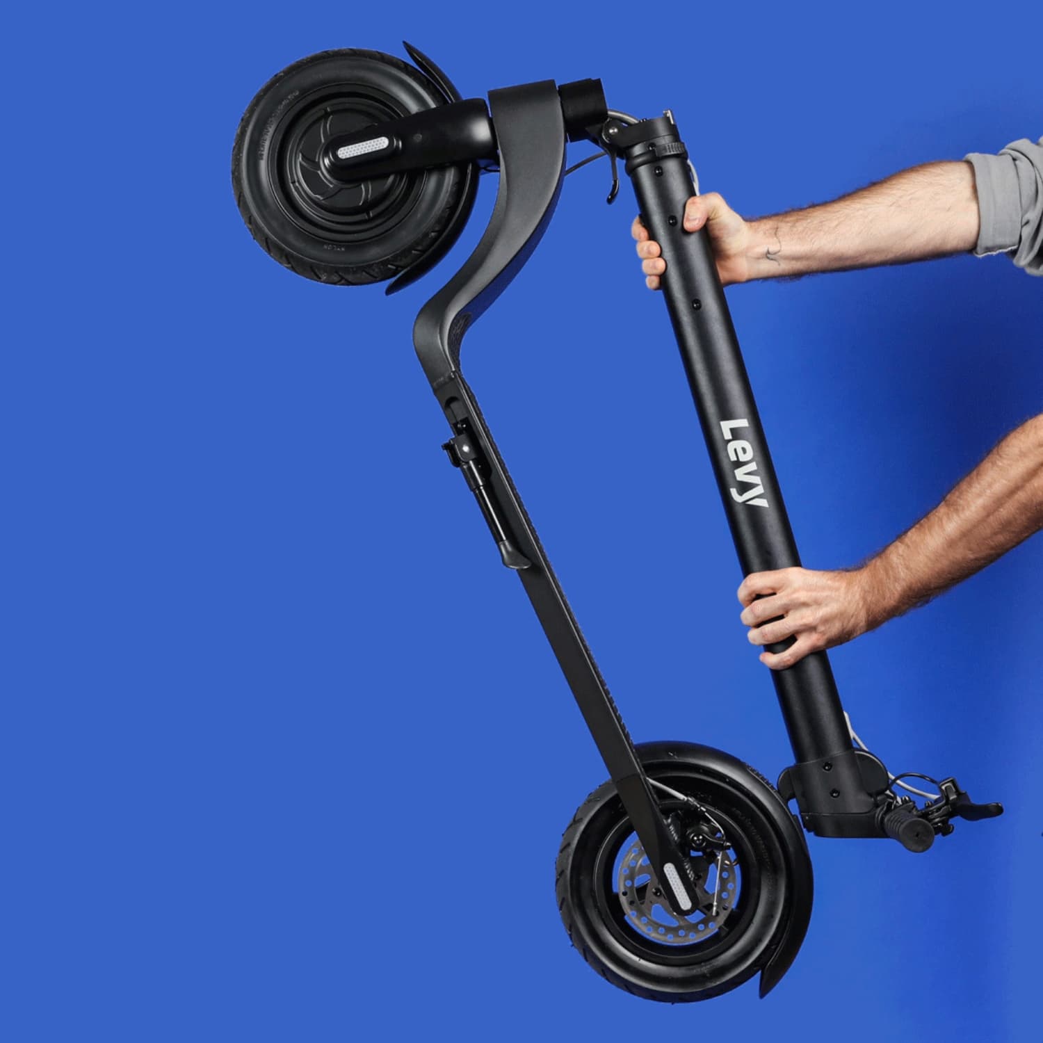 Lifting a folded Levy scooter